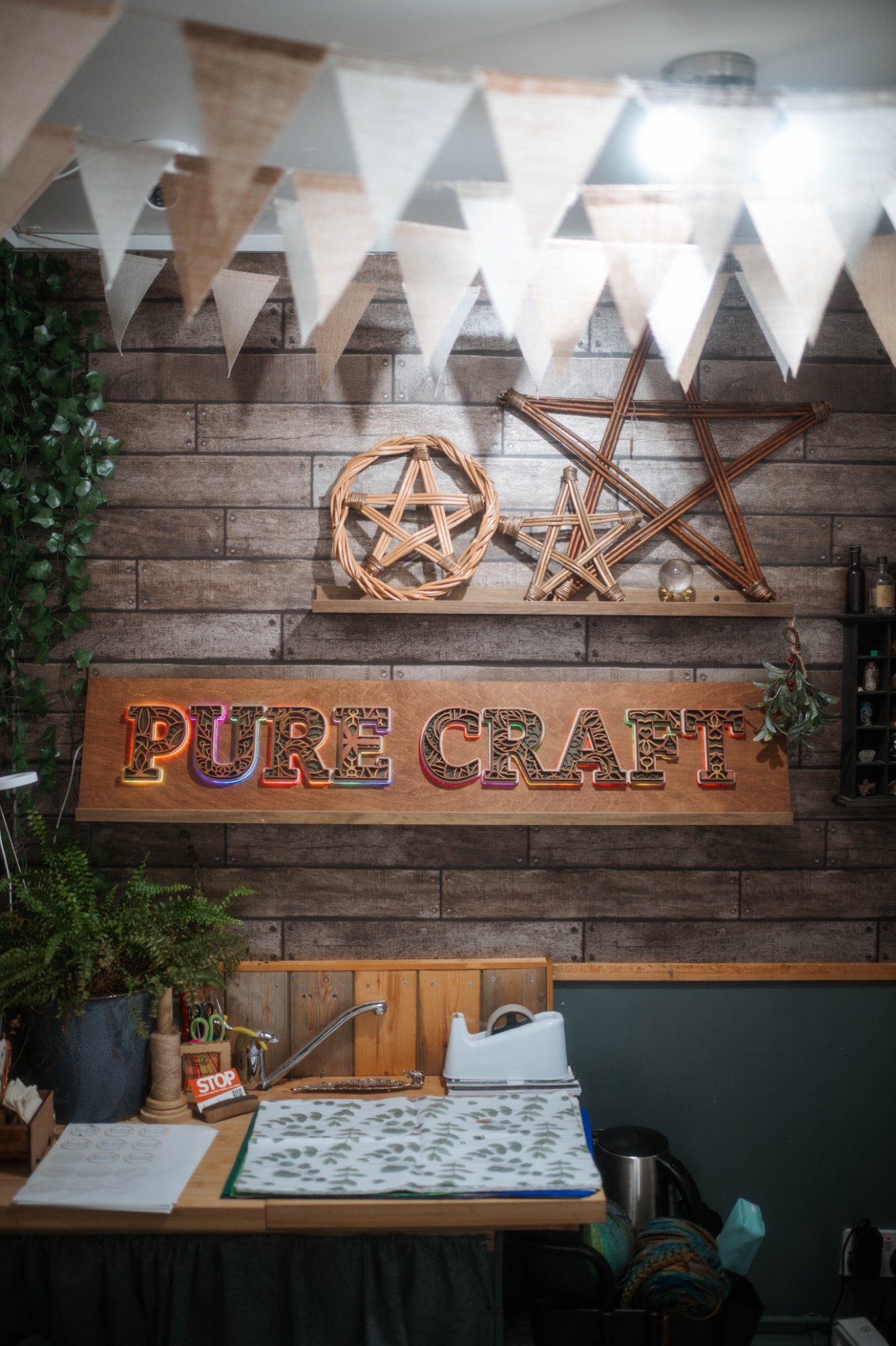 Pure Craft sign installed in shop